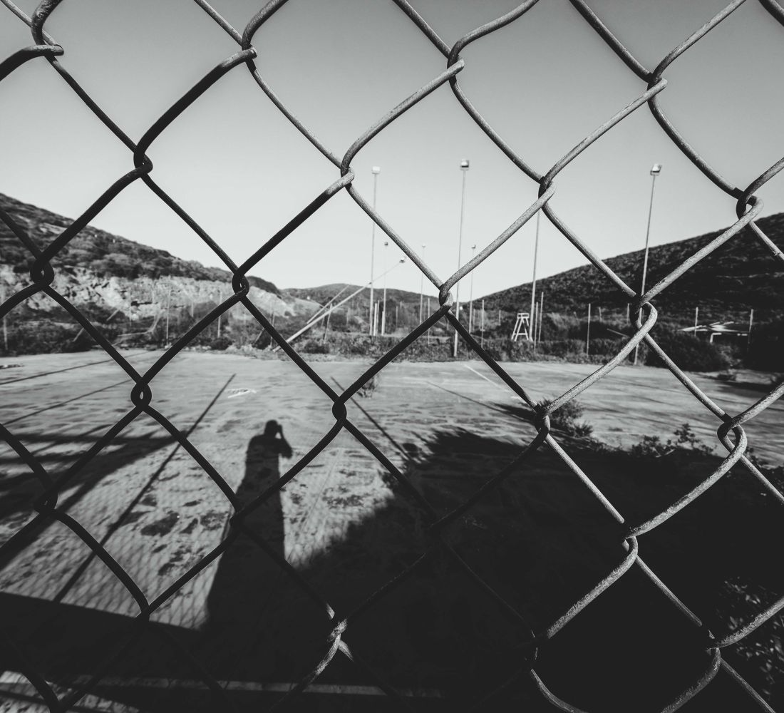 Chain-link fence around a sports court